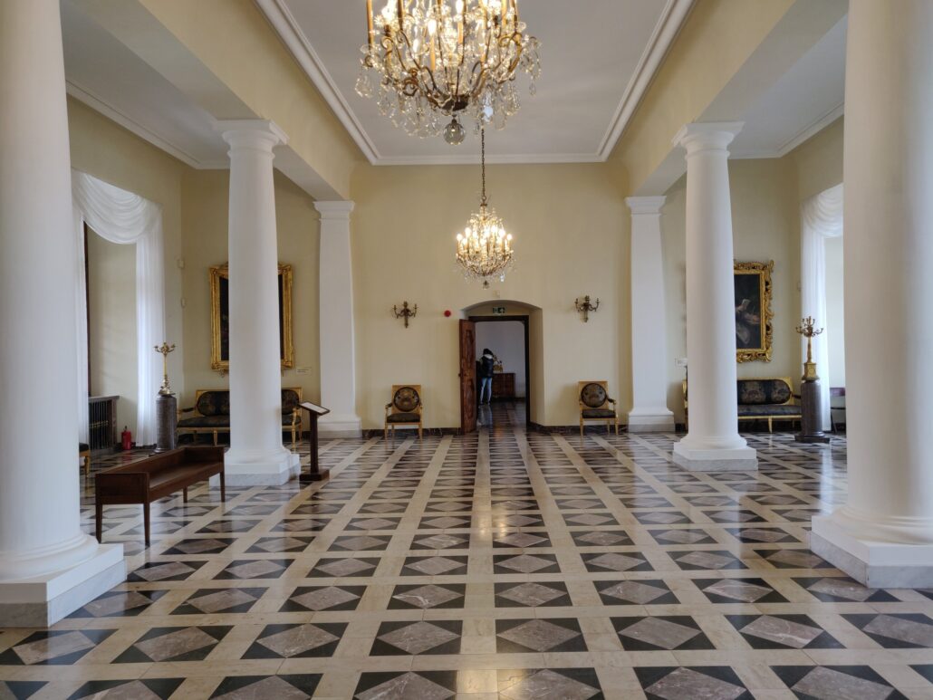 Atcracow Tour Elegant Hallway Chandeliers Marble Floor