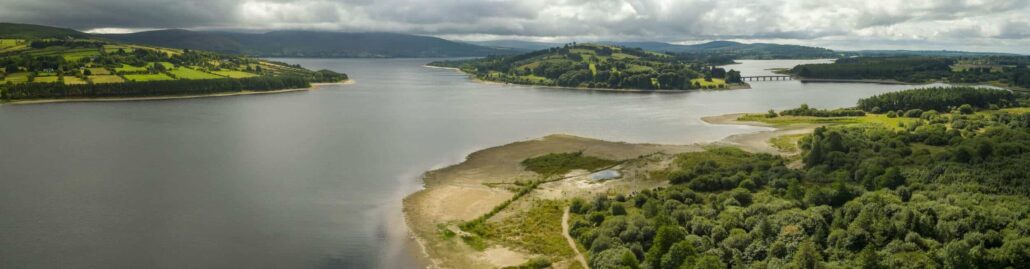 Irish Luxury Day Tours Tour River Green Hills Cloudy Sky