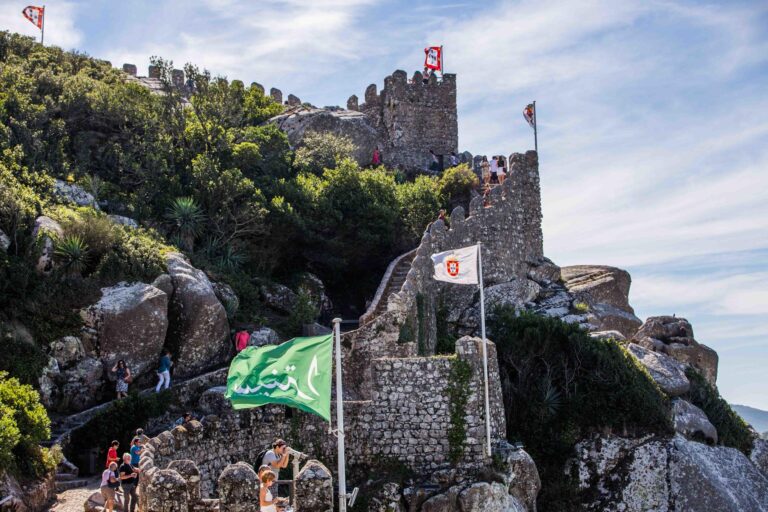 Lisbononwheels Tour Castle Ruins Flagged Hillside