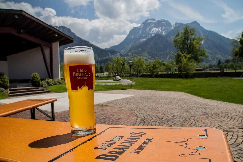 Mikesbiketours Tour Beer Glass Mountains Sunny Day