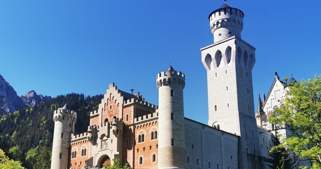 Mikesbiketours Tour Castle Tower Mountains Blue Sky