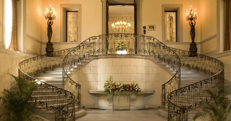 Ohekacastle Tour Grand Staircase Chandelier Floral Arrangement