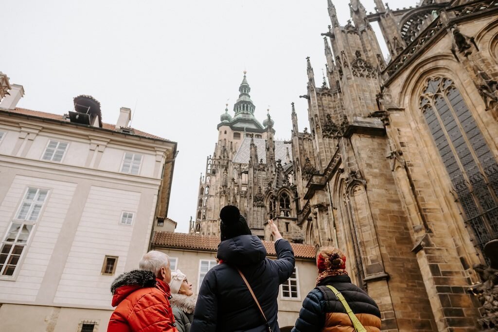 Praguecityadventures Tour Tourists Pointing Cathedral Tower