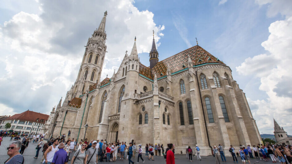 Tastehungary Tour Gothic Church Crowd Clouds